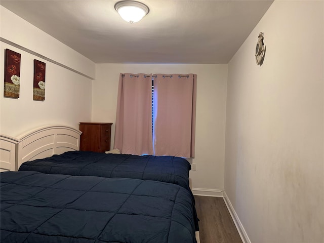 bedroom featuring hardwood / wood-style flooring