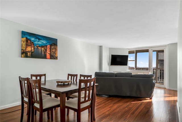 dining room featuring hardwood / wood-style flooring