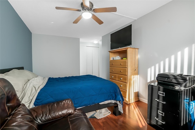 bedroom featuring hardwood / wood-style flooring and ceiling fan