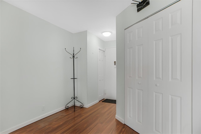 interior space with dark hardwood / wood-style floors