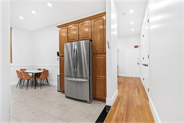 kitchen featuring stainless steel refrigerator