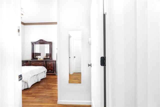 bedroom featuring dark hardwood / wood-style flooring