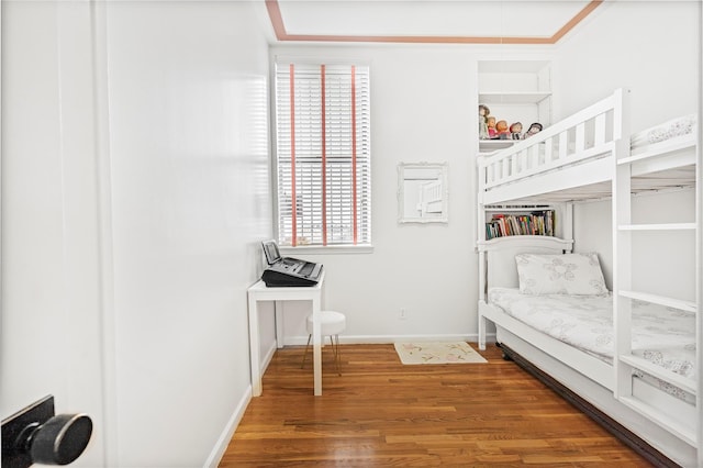 bedroom with wood-type flooring