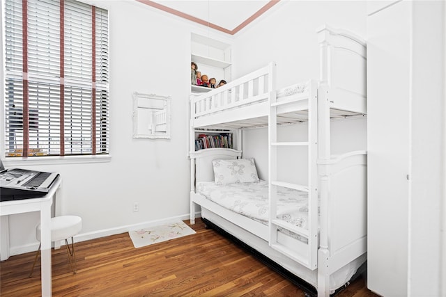 bedroom featuring dark hardwood / wood-style floors