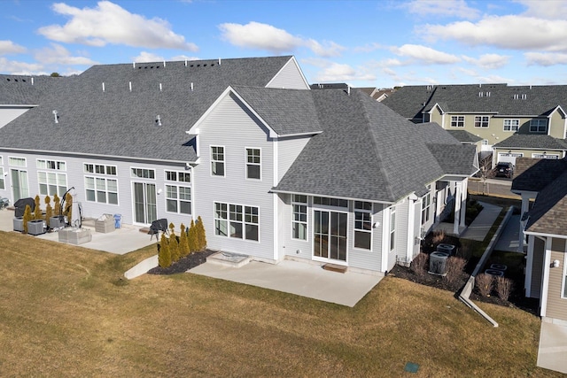 back of house with a yard, a patio, and central AC unit