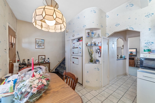 dining room featuring light tile patterned floors