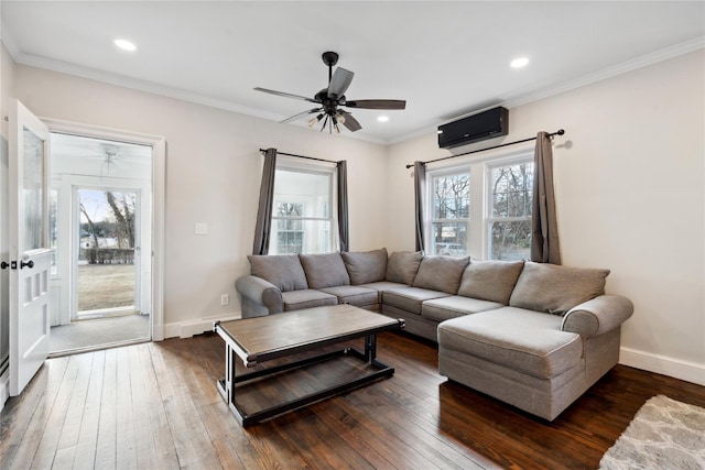 living room with crown molding, ceiling fan, and dark hardwood / wood-style flooring