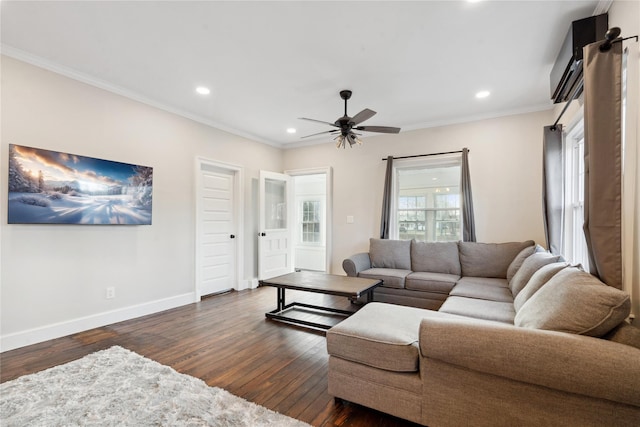 living room featuring ceiling fan, dark wood-type flooring, ornamental molding, and a wall mounted AC