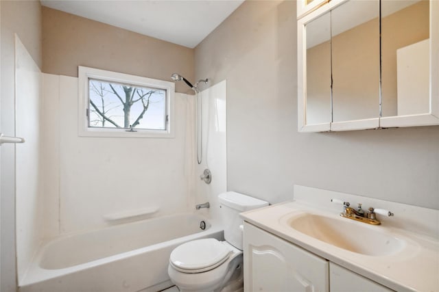 full bathroom with shower / tub combination, vanity, and toilet