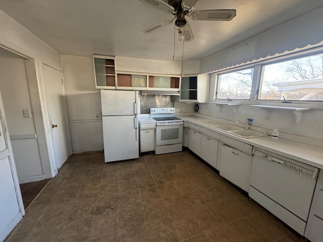 kitchen featuring ceiling fan, white appliances, sink, and white cabinets