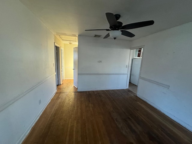 empty room featuring dark wood-type flooring