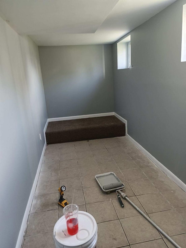 spare room featuring tile patterned floors