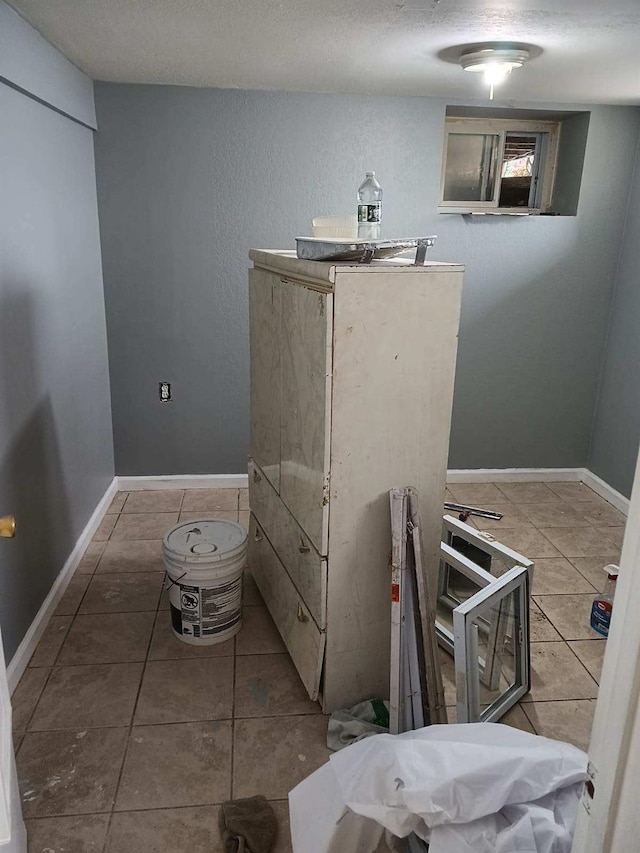 interior space with tile patterned floors