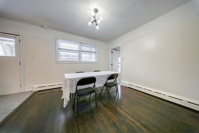 tiled dining space featuring baseboard heating and a chandelier