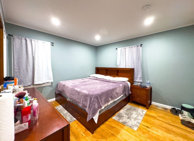 bedroom featuring light hardwood / wood-style floors