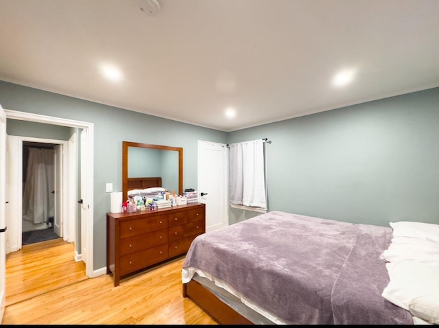 bedroom with light wood-type flooring