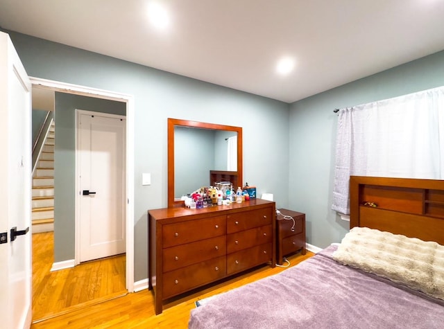 bedroom featuring light wood-type flooring