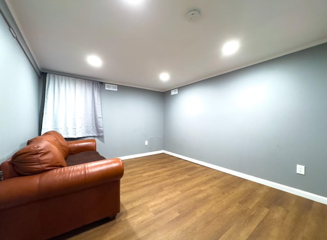 living area with light hardwood / wood-style floors