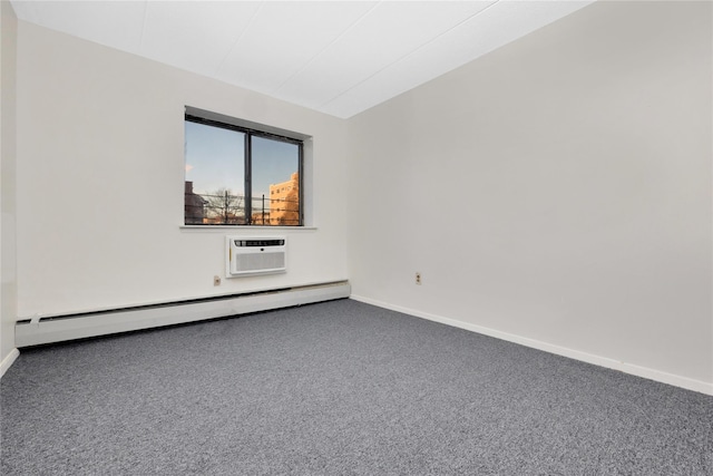 spare room with carpet, a wall unit AC, and a baseboard radiator