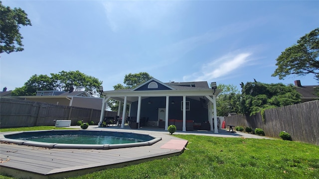 29 Oak St, Islip, NY 11751 - back of house with a fenced backyard and a patio area