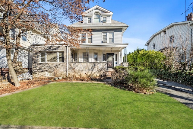 view of property with a front lawn