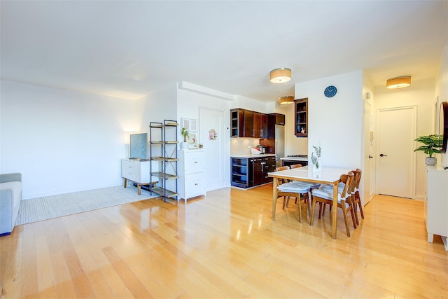 dining area with light wood-type flooring