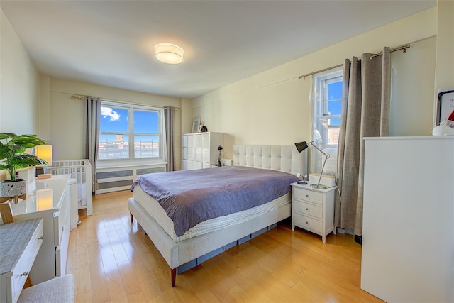 bedroom featuring light wood-type flooring