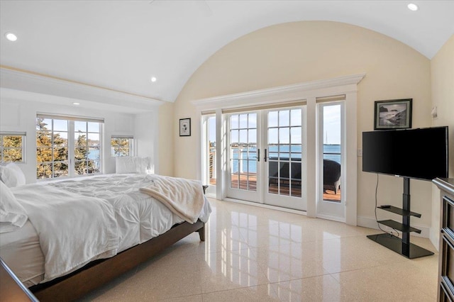 bedroom with access to outside, french doors, and vaulted ceiling