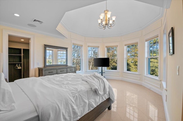 bedroom with crown molding and a chandelier