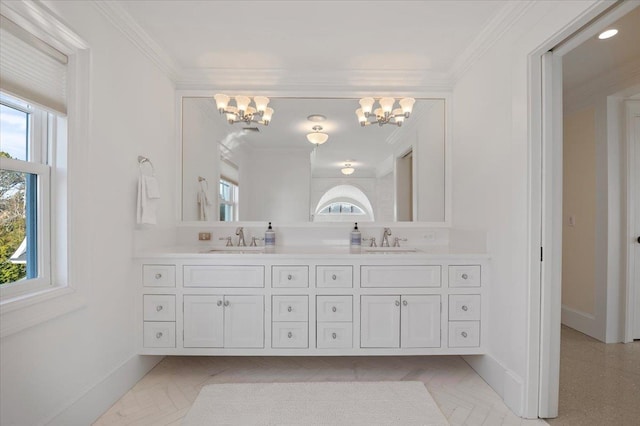 bathroom with plenty of natural light, vanity, and ornamental molding