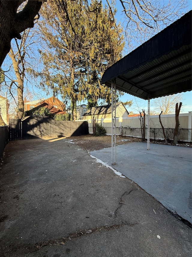 exterior space featuring a carport