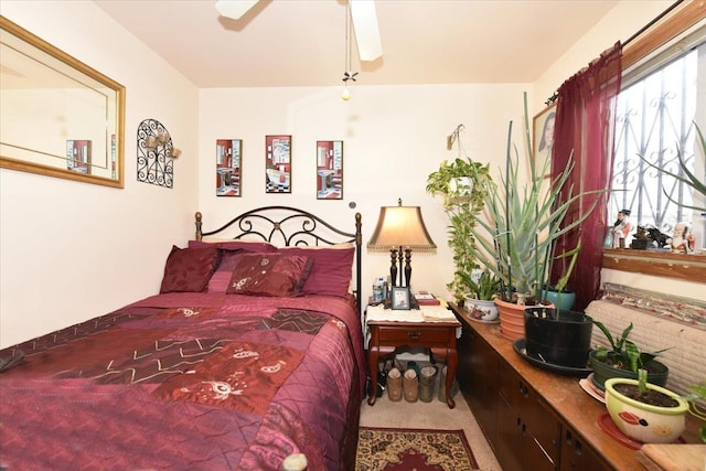 bedroom with carpet floors and ceiling fan