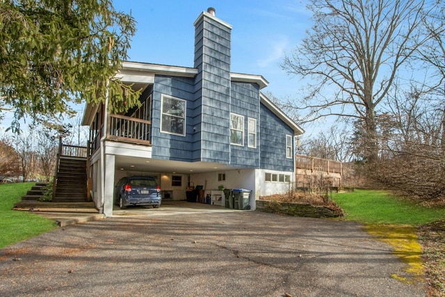 view of property exterior with a carport