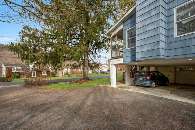 exterior space featuring a carport