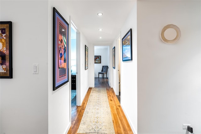 corridor featuring light wood-type flooring