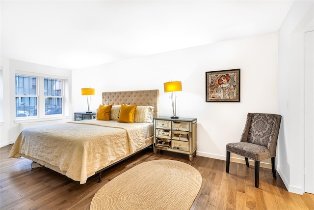 bedroom featuring wood-type flooring