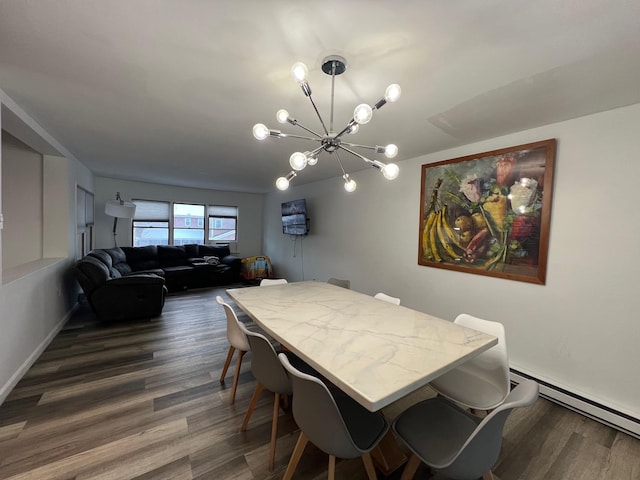 dining room with a baseboard radiator, dark hardwood / wood-style floors, and a notable chandelier