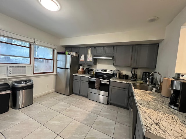 kitchen featuring sink, gray cabinets, cooling unit, stainless steel appliances, and light stone countertops