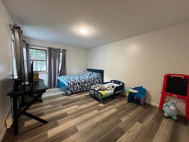 bedroom featuring hardwood / wood-style flooring