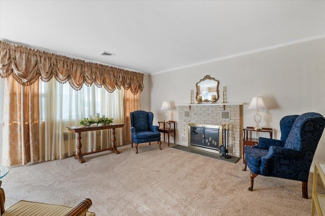 sitting room featuring carpet flooring, ornamental molding, and a fireplace