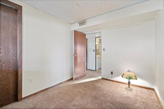 unfurnished room featuring carpet floors