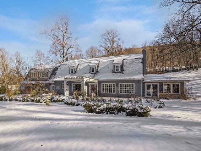 view of snow covered property