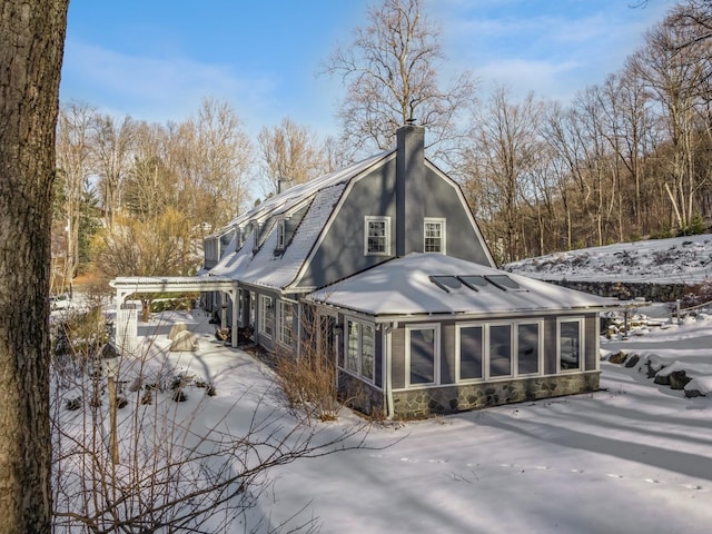 view of snow covered property