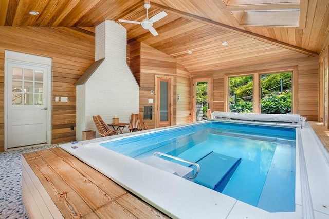 view of pool with an indoor hot tub and ceiling fan