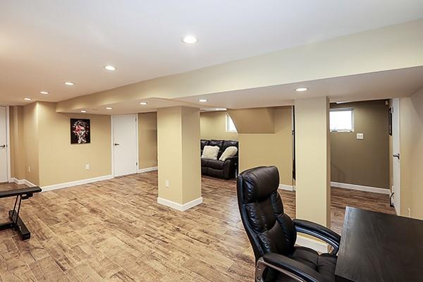 office with light hardwood / wood-style flooring