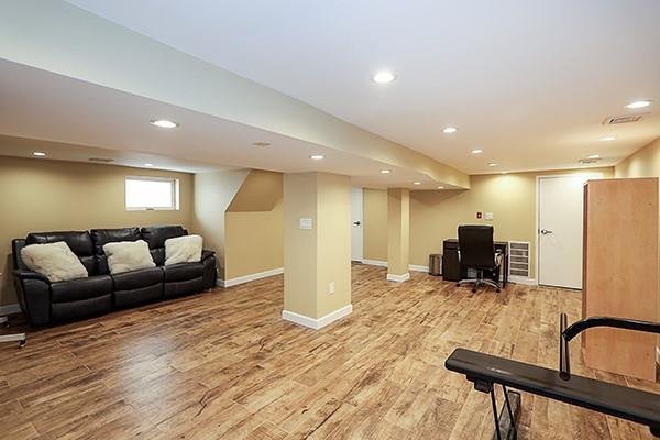 exercise area with light wood-type flooring