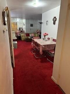 dining room featuring carpet flooring