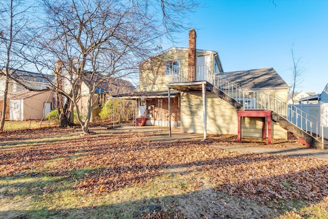 rear view of house featuring a patio area