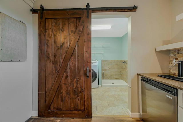 bathroom featuring washer / clothes dryer