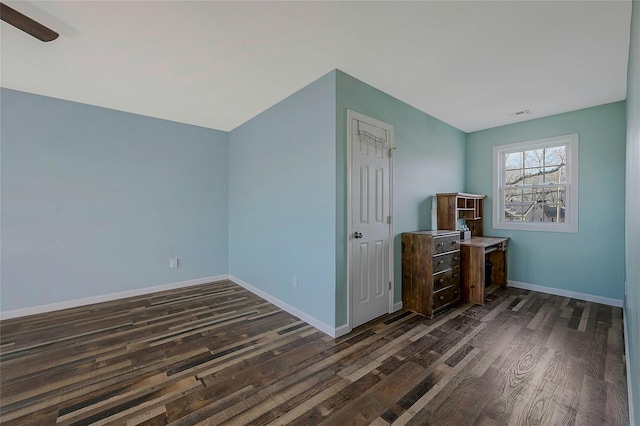 interior space with dark hardwood / wood-style flooring